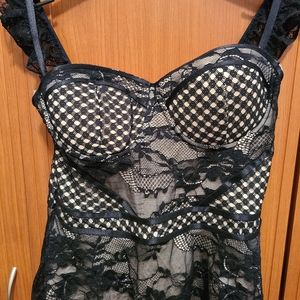 bebe  Lace zipper back peplum top